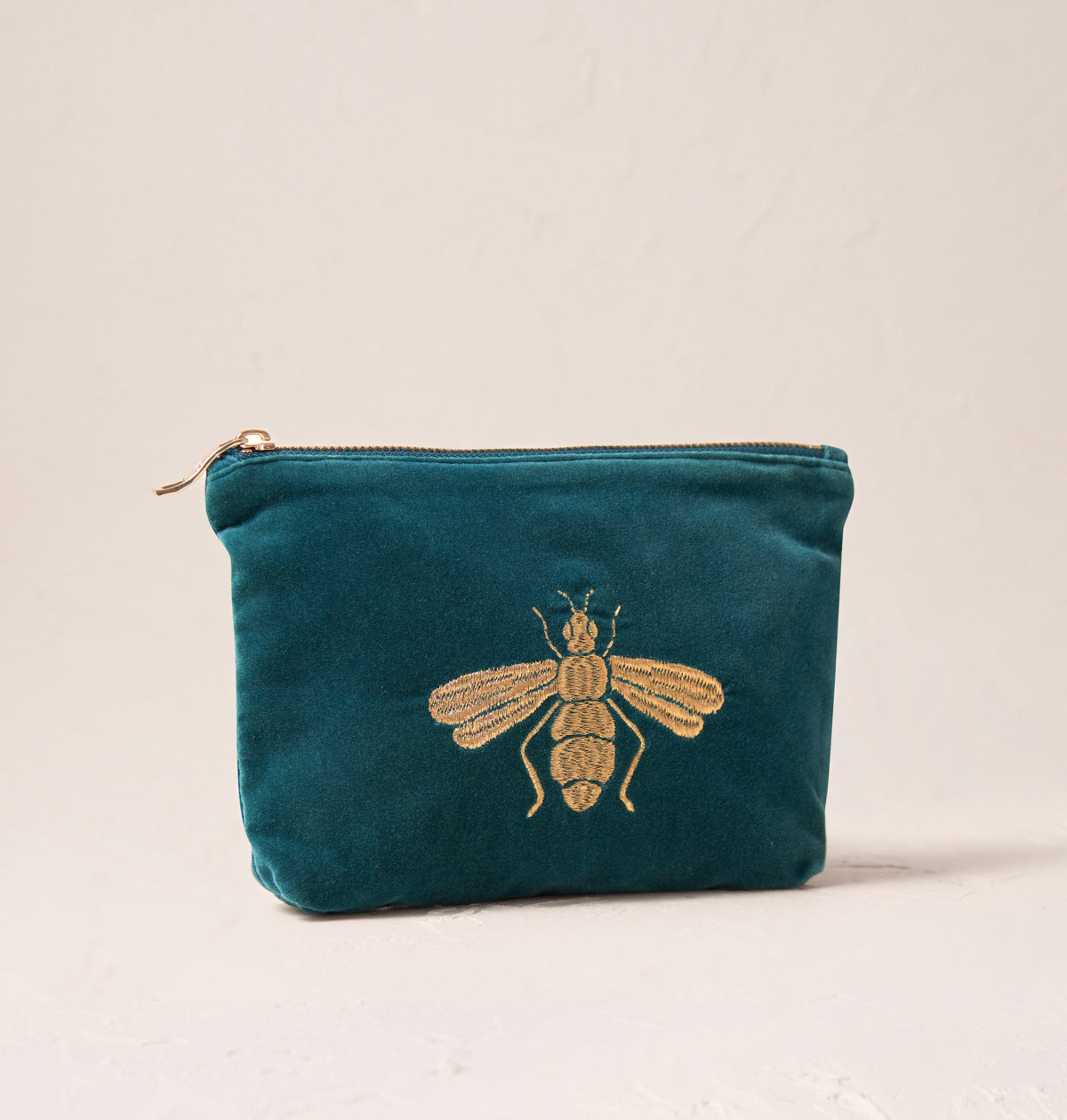 Elizabeth scarlett honey bee in rich blue mini pouch £38