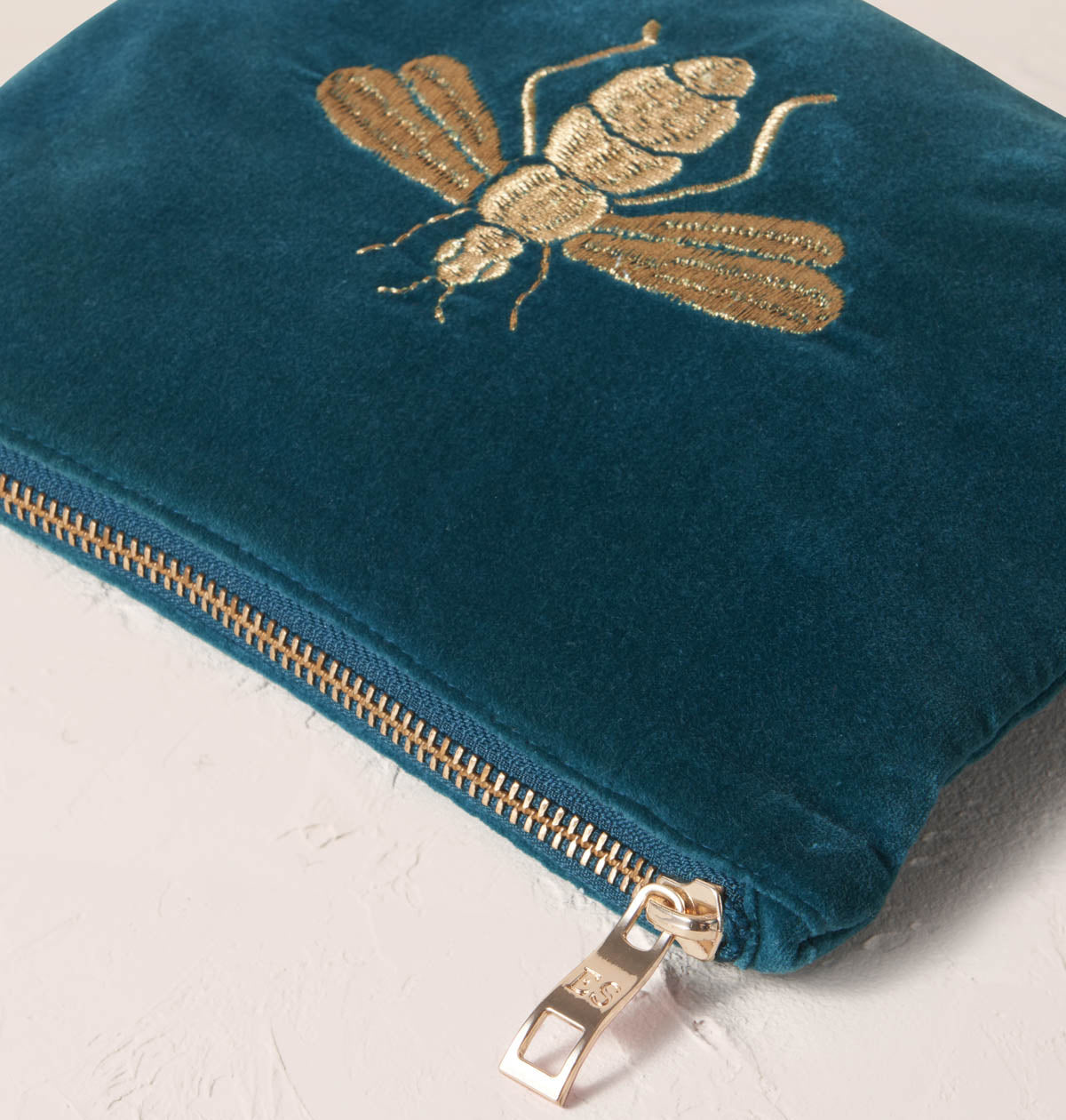 Elizabeth scarlett honey bee in rich blue mini pouch £38